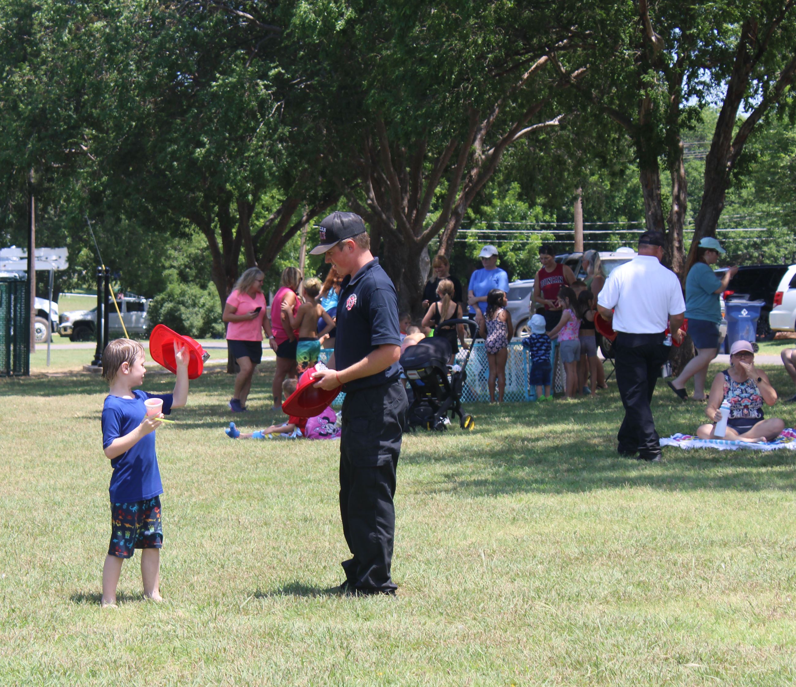 Fire Fighter talking with kid