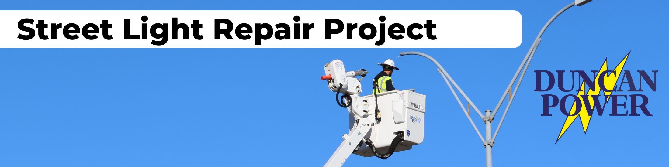 A Duncan Power lineman repairs street light along Highway 81